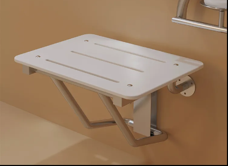 Asiento de ducha plegable sujeto a la pared en acero inoxidable para discapacitados, y personas geriátricas marca Plomex